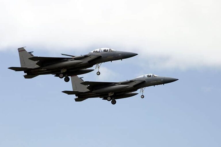 Two F15 fighter jets in the air