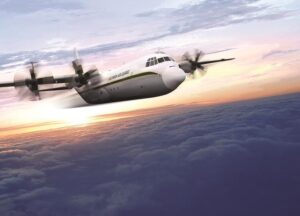 A C-130 in flight. A green line is stenciled on the side and Air Cargo written on the plane.